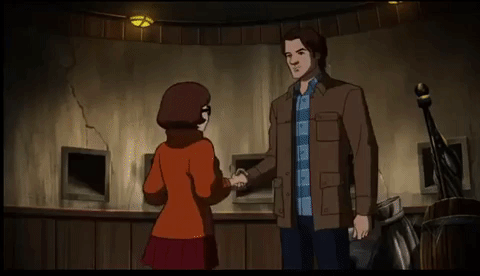 GIF of animated woman with short hair and glasses pulling an animated Sam into a dip and kiss