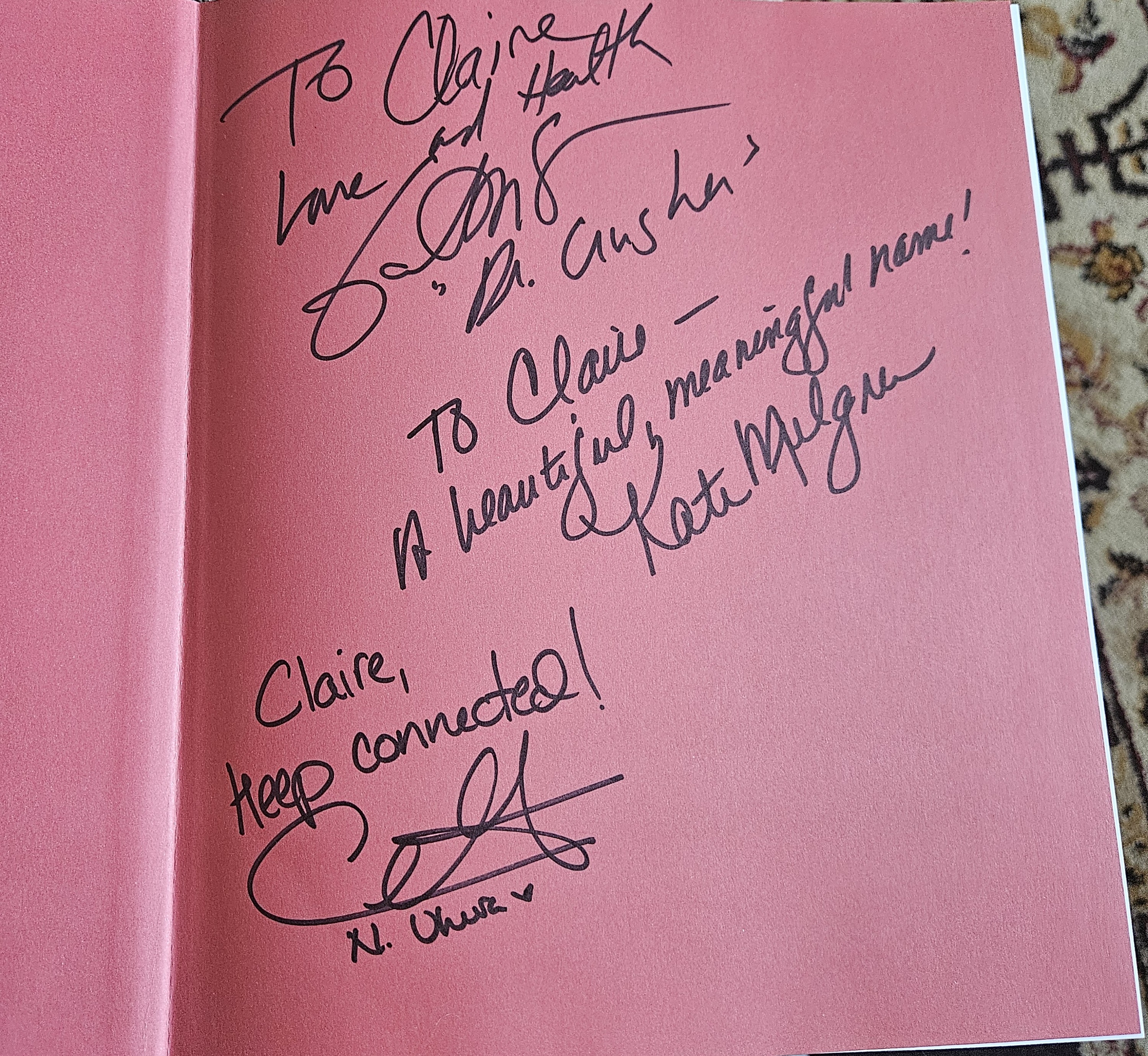 3 signatures on the inside cover of my Open a Channel book. "Love and health, Gates McFadden, Dr. Crusher," "Claire, a beautiful and meaningful name, Kate Mulgrew," and "keep connected, Celia Rose Gooding, N. Uhura."