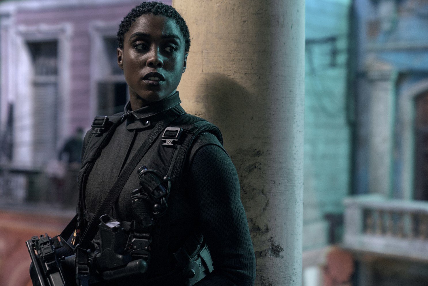 Lashana Lynch, a Black woman, in combat gear