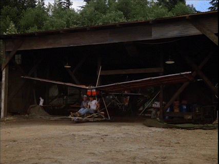 MacGyver and an ally riding a plane made out of bamboo along a makeshift runway. Ally says "it'll never fly" and Mac says "You don't know that!"