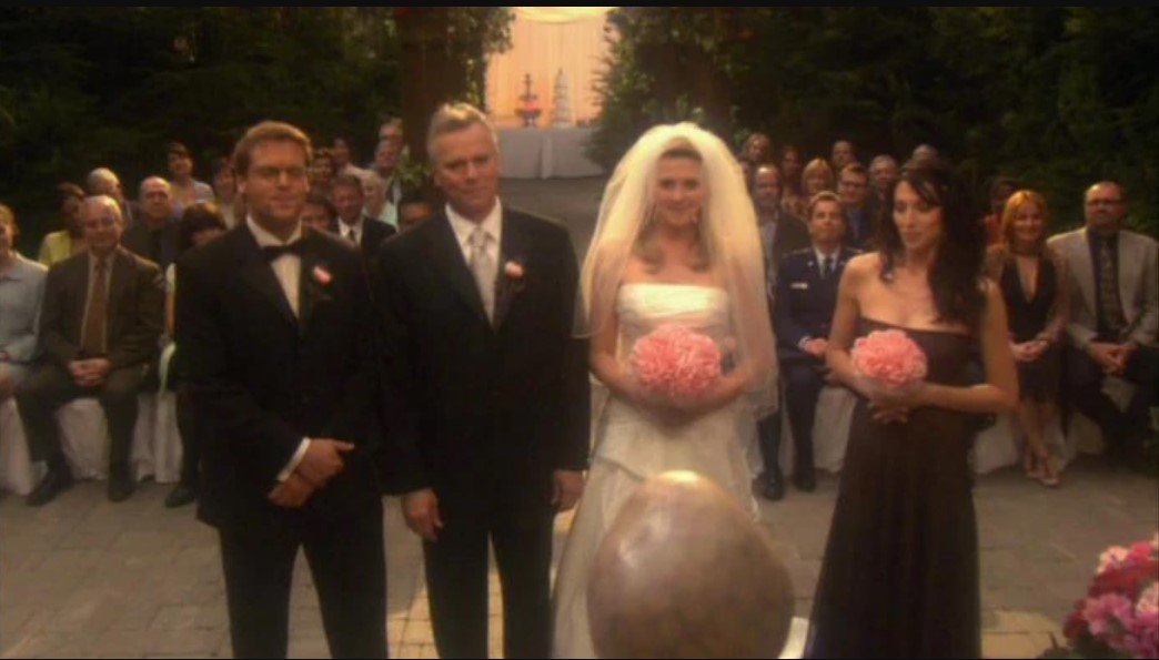 Screenshot from the episode "200" in which Vala imagines a wedding where Daniel is Best Man, Jack is the groom, Sam is the bride, and Vala is maid of honor