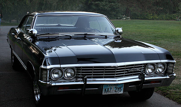 a black 1967 Chevy Impala